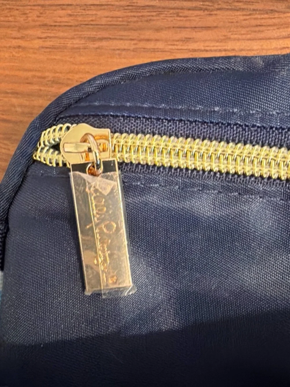 Lilly Pulitzer Navy Satin cross body or Belt Bag with Gold Medallion. NWT